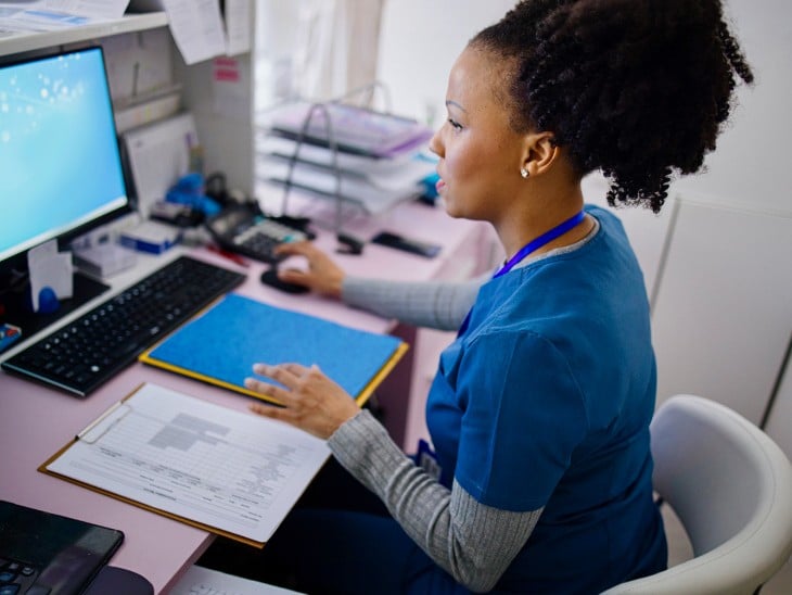 Woman looking at computer working