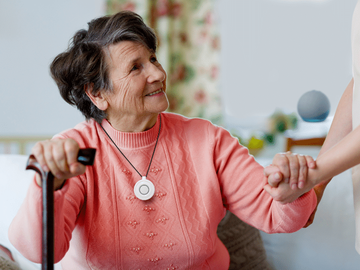 Senior Woman Looking At Caregiver